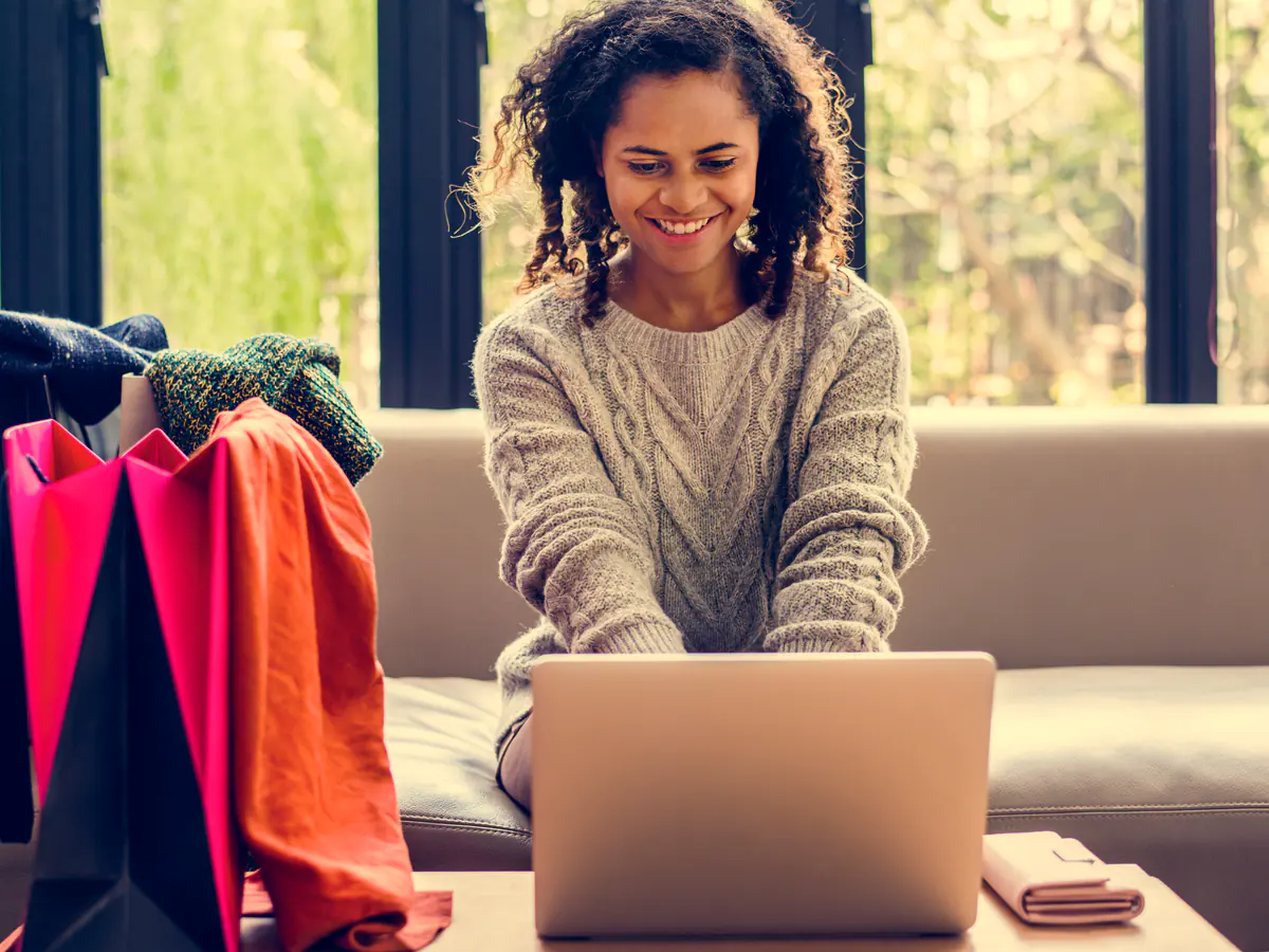 An online shopper buying from a laptop at home